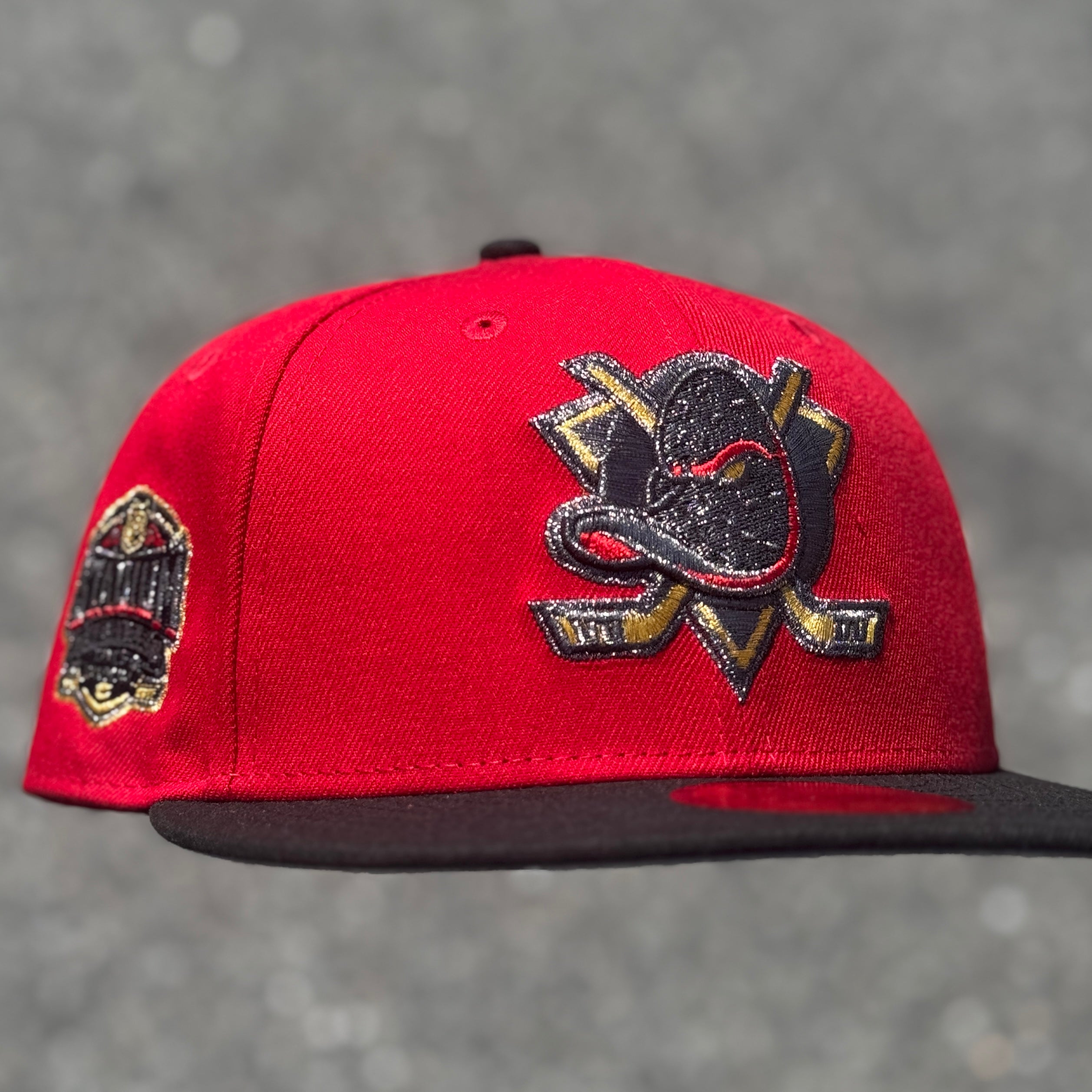 Anaheim Ducks Stadium Series Side Patch Fitted Hat New Era 5950 NHL (Red/ Black / Gold / Metallic Black / Gray)