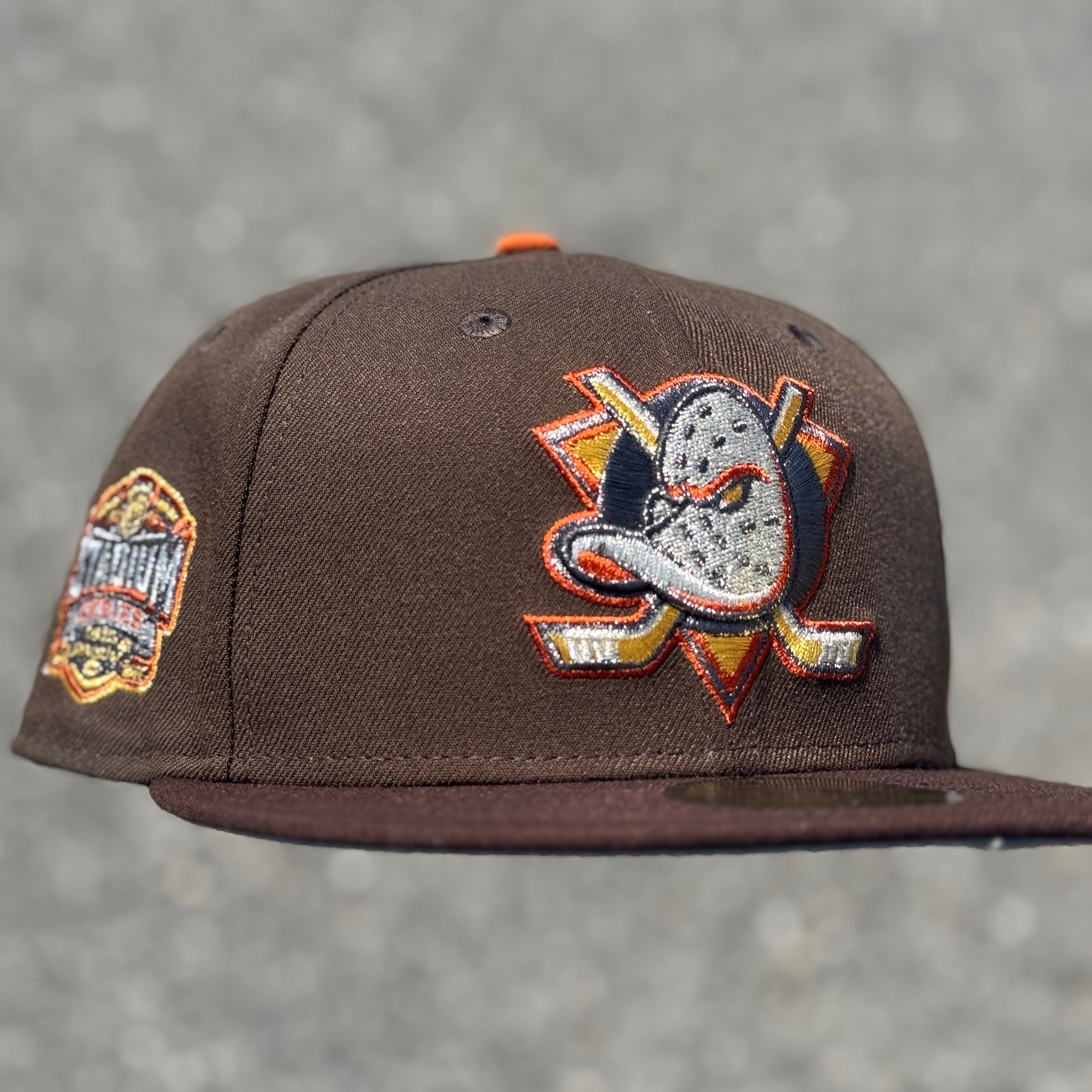 Anaheim Ducks Stadium Series Side Patch Fitted Hat New Era 5950 NHL (Walnut Brown / Burntwood Brown / Gold / Copper / Silver / Orange / Gray)